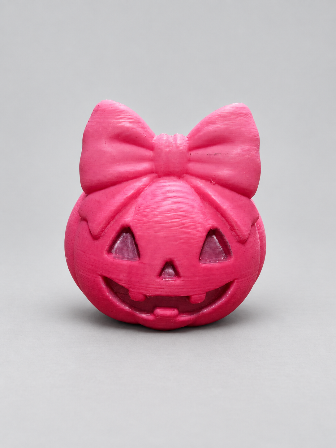 Finished cute jack-o'-lantern with large bow made from a resin mold
