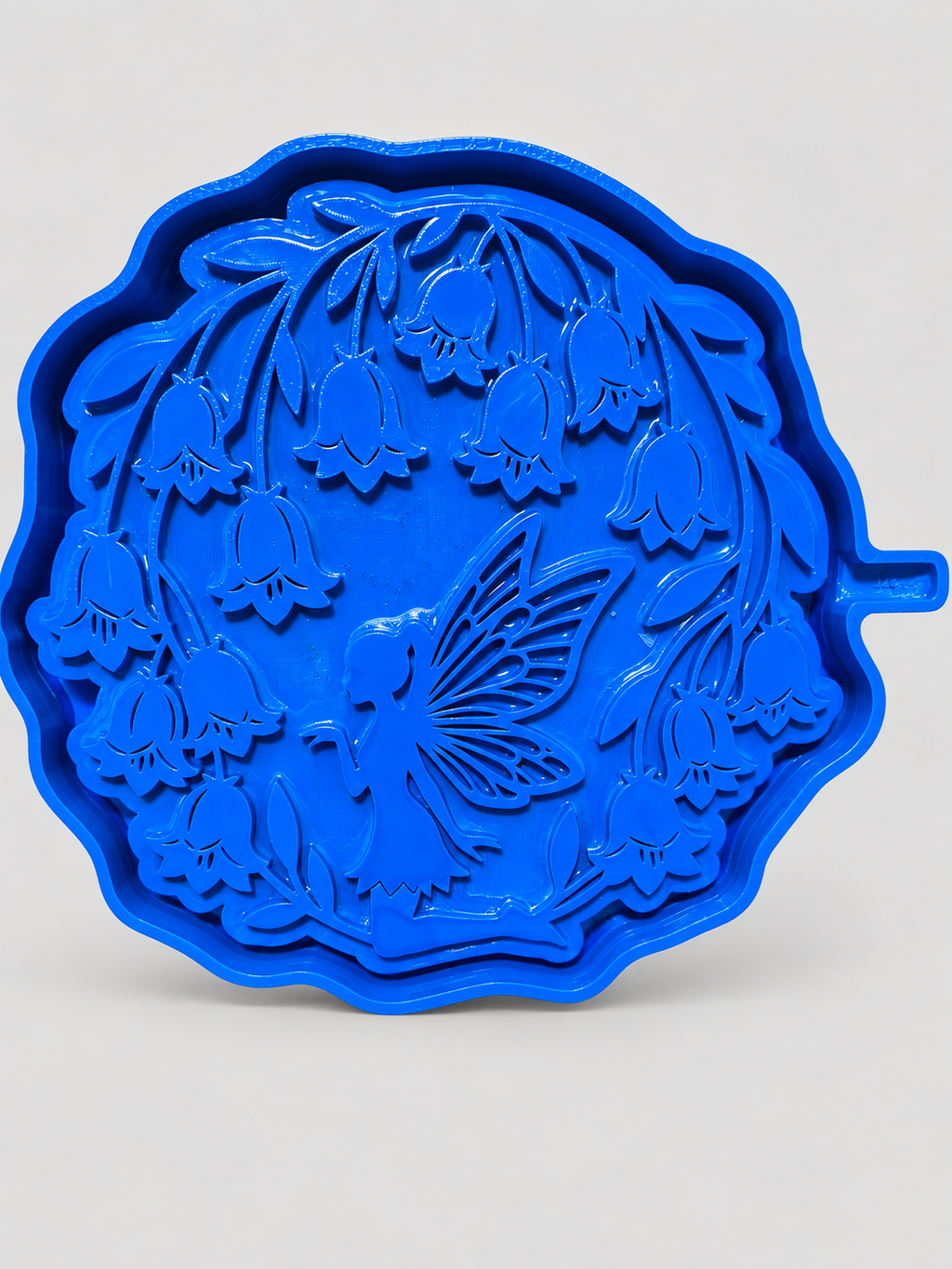 Blue Lily of the Valley fairy silicone mold on a clean light-gray background
