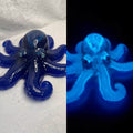 Poxy Princess Octopus mold example showing blue octopus casting in regular light and glowing