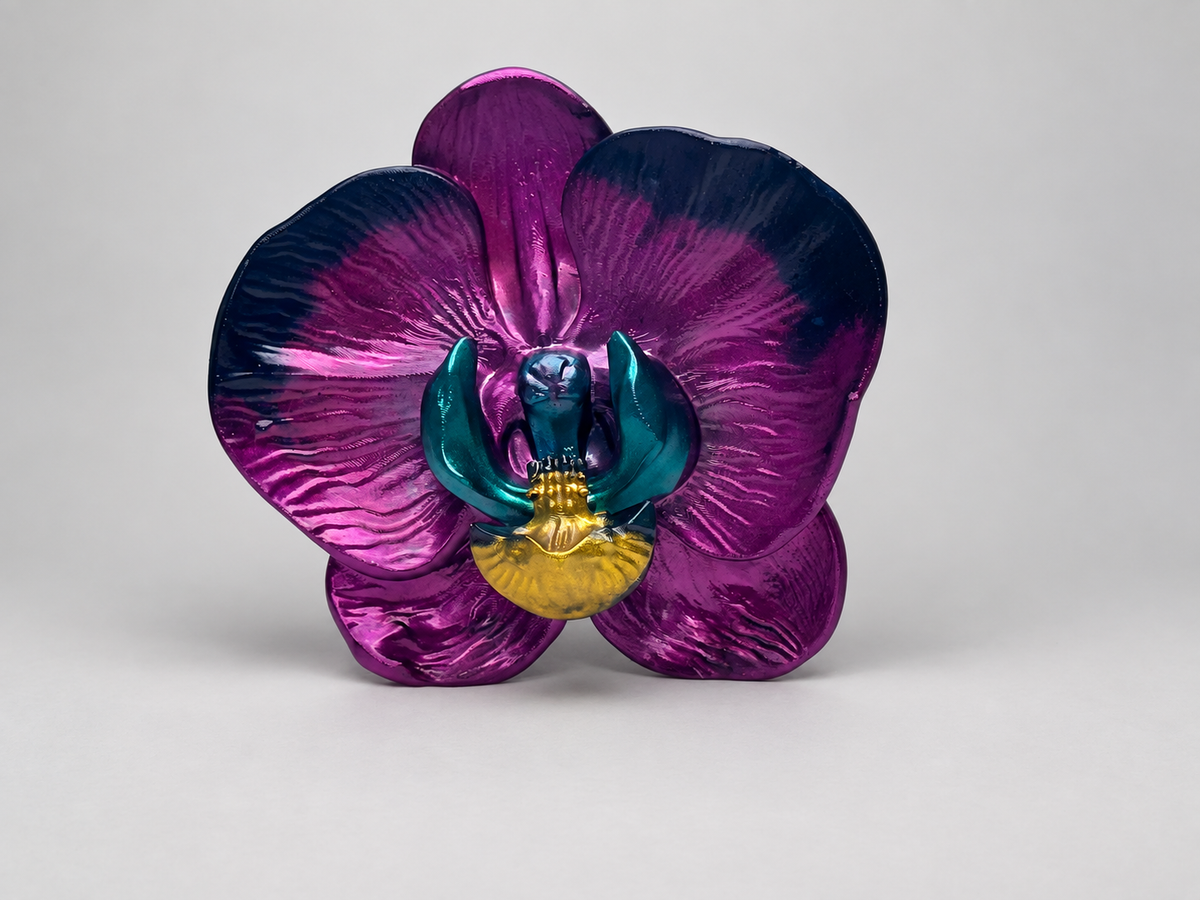 Finished purple teal and gold sculptural orchid flower made from a resin mold
