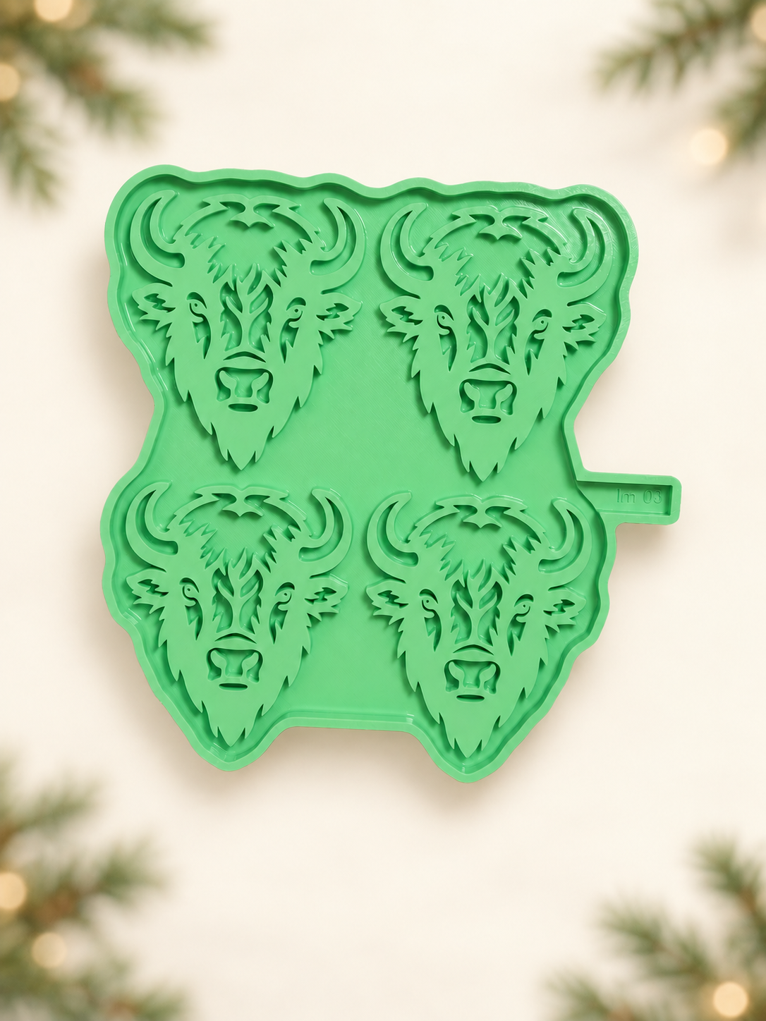 Buffalo Ornament Mold on a subtle Christmas background