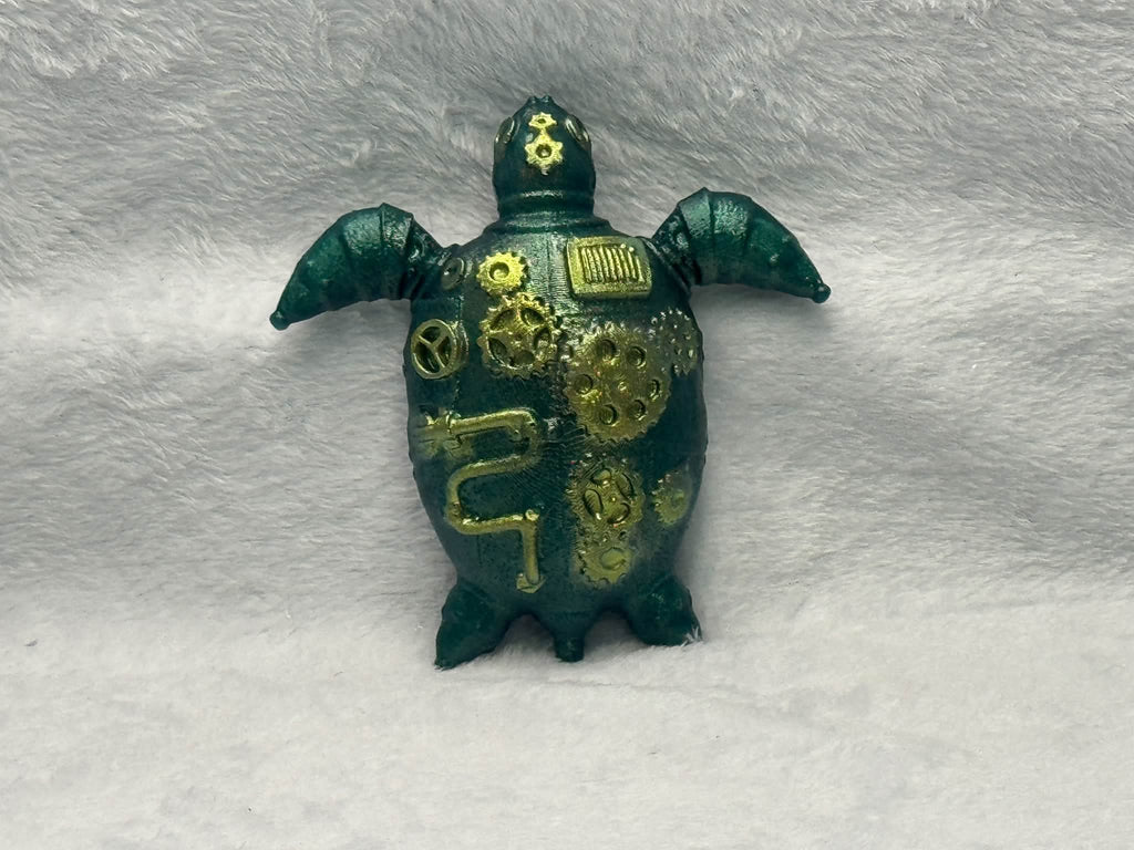 Green and gold finished resin pour example of the Steampunk Turtle Mold