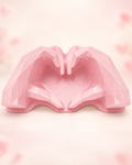 Heart hands mold on a subtle blush Valentine's background