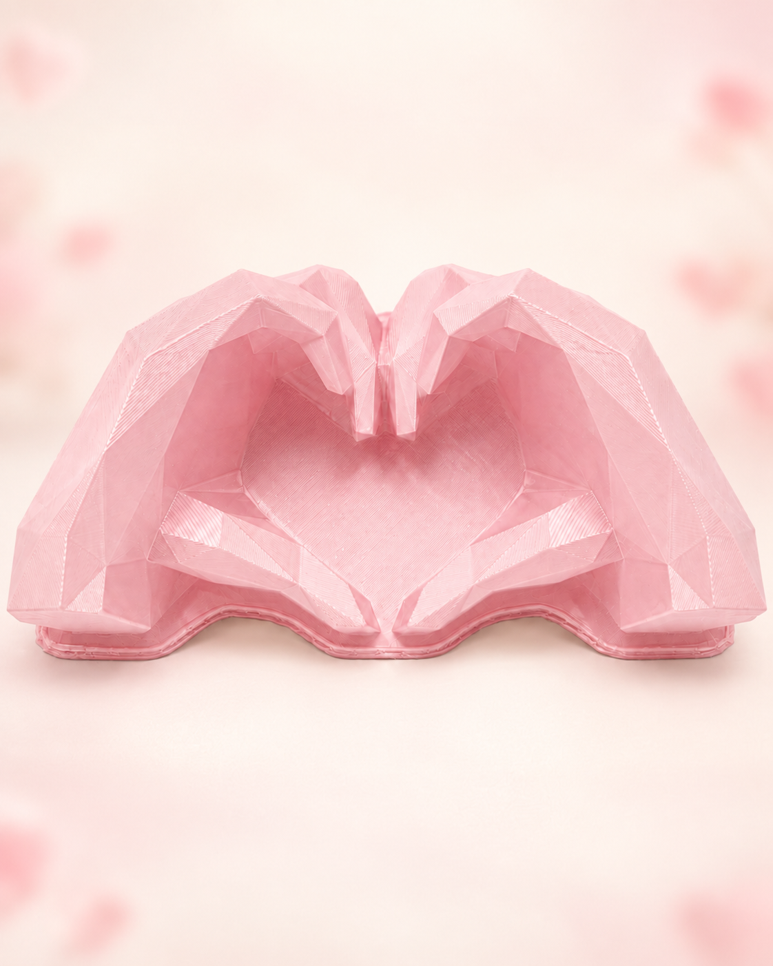 Heart hands mold on a subtle blush Valentine's background